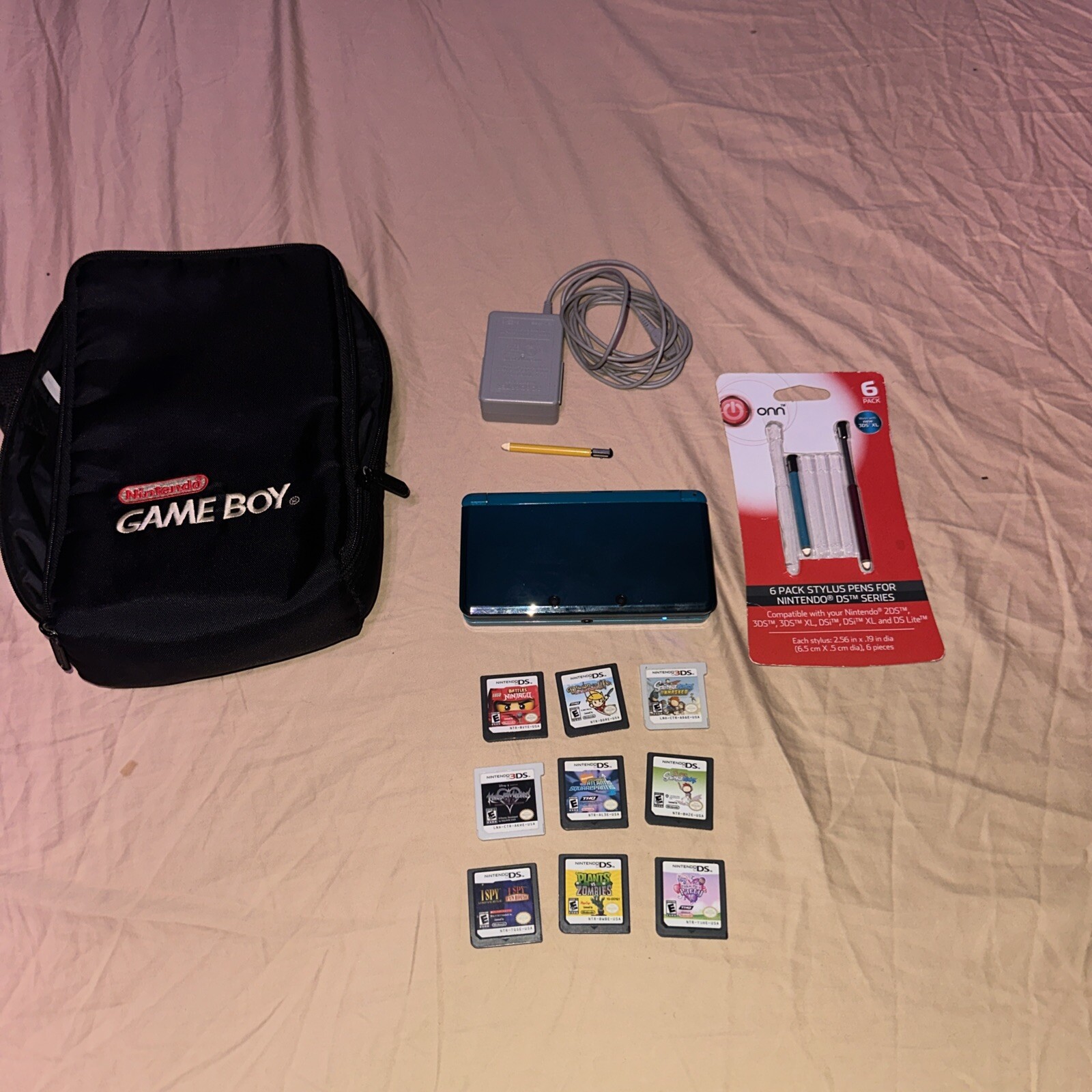Nintendo 3DS Aqua Blue Bundle W/ 9 Games, CHARGER, SD CARD, Carry Bag, Styluses