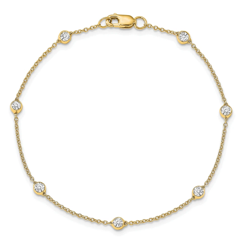 Brazalete de tenis de estación de diamantes de laboratorio de oro amarillo macizo de 14K Foto 4 de 4