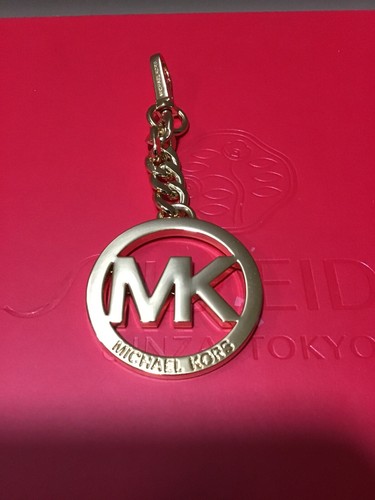 michael kors gold hang tag