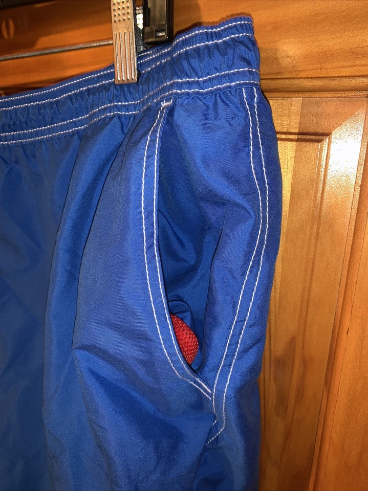 Pantalones cortos de natación IZOD para hombre azules con detalles rojos blancos talla XL retro Foto 3 de 4