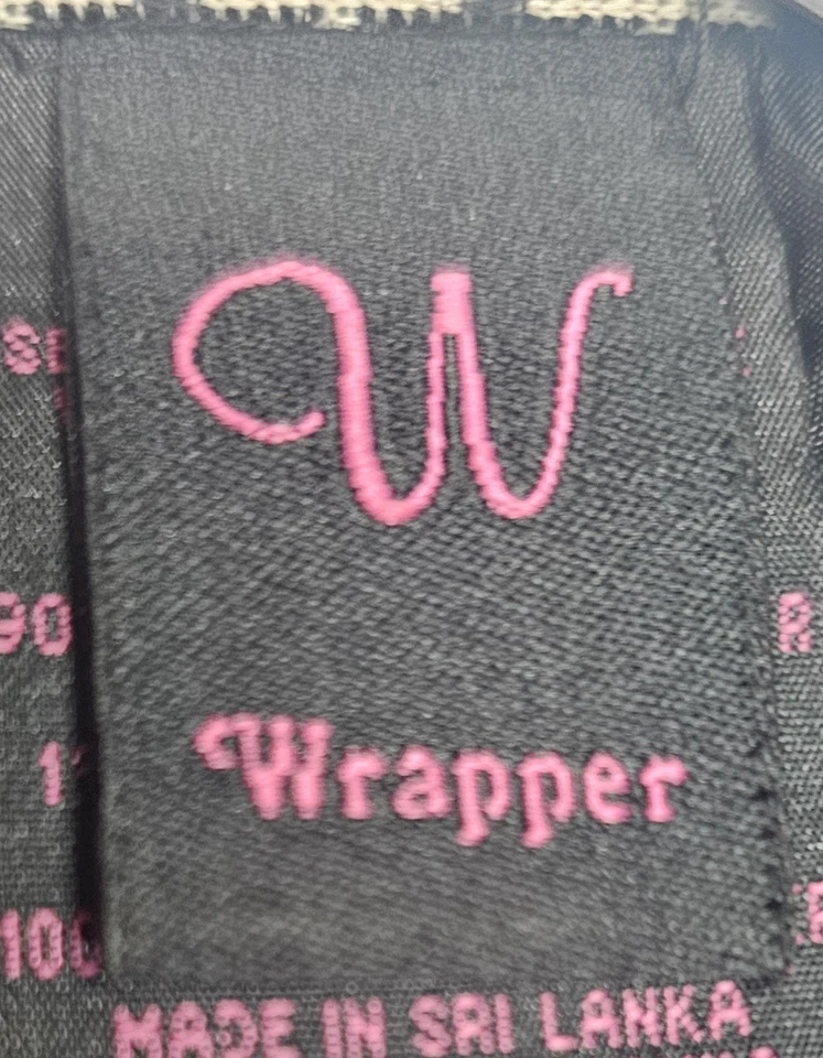 Chaqueta con cinturón de longitud media Wraper para mujer talla grande Foto 3 de 4