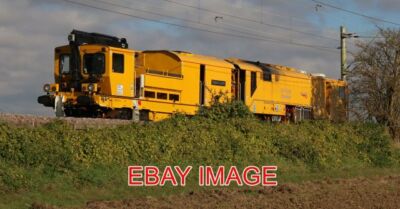 PHOTO  DR30301 STEPHEN CORNISH NETWORK RAIL STONEBLOWER (2) AT RIVENHALL  BEAUTI