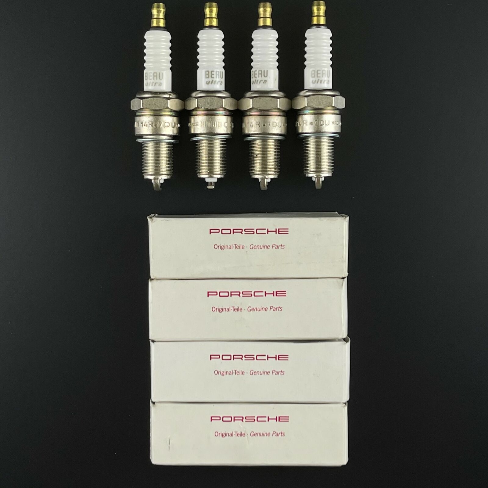 1985-1989 Porsche 911 OEM Engine Ignition Coil Spark Plug Set Of 4 99917015690