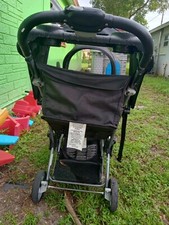 Two sets baby stroller black and red by baby trend
