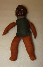 PETIT BAIGNEUR ANCIEN TÊTE NOIRE.  CORPS ET MEMBRES RECOUVERTS DE TISSUS