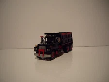 FIRST GEAR DCP 1/64 BLACK AND RED MACK R-MODEL TANDEM AXLE DUMP TRUCK
