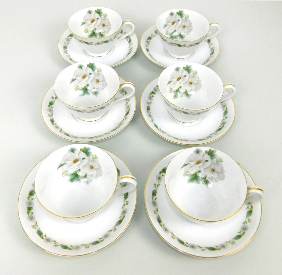 Noritake Nippon Toki Kaisha - Juego de 12 tazas y platillos de té Gardenia blancos Foto 2 de 4