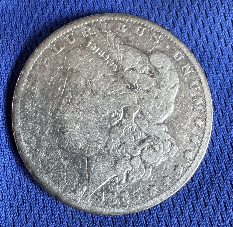 1885-O United States Morgan Silver Dollar 90% Silver Fine Condition