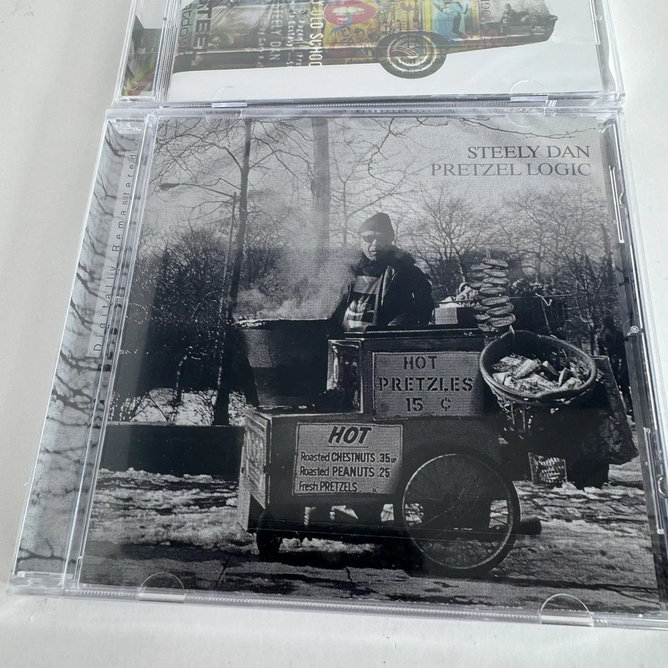 Steely Dan Cd Lot Pretzel Logic The Best Of SEALED Rikki Don't Lose That Number Foto 2 de 4