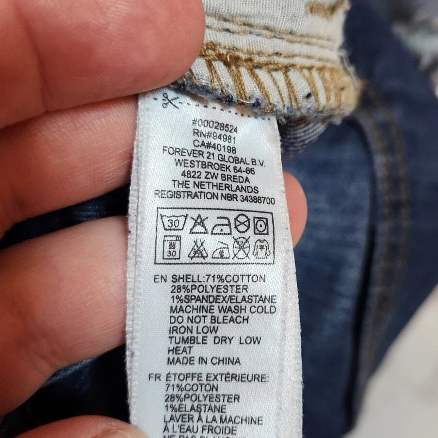 Forever 21 Women's Blue Solid Stretch Mid Rise Distressed Skinny Jeans Size 14 - Image 4 of 4