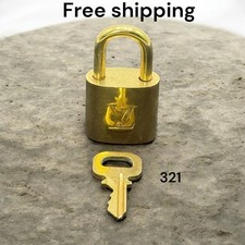 Preloved Authentic Louis Vuitton padlock with a Key 321.
