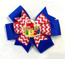 Beautiful M&M Candy inspired hair bow for girls.