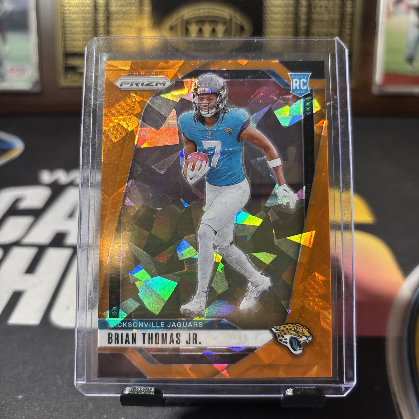 2024 Panini Prizm - Rookies Brian Thomas Jr. #314 Orange Ice Prizm (RC)