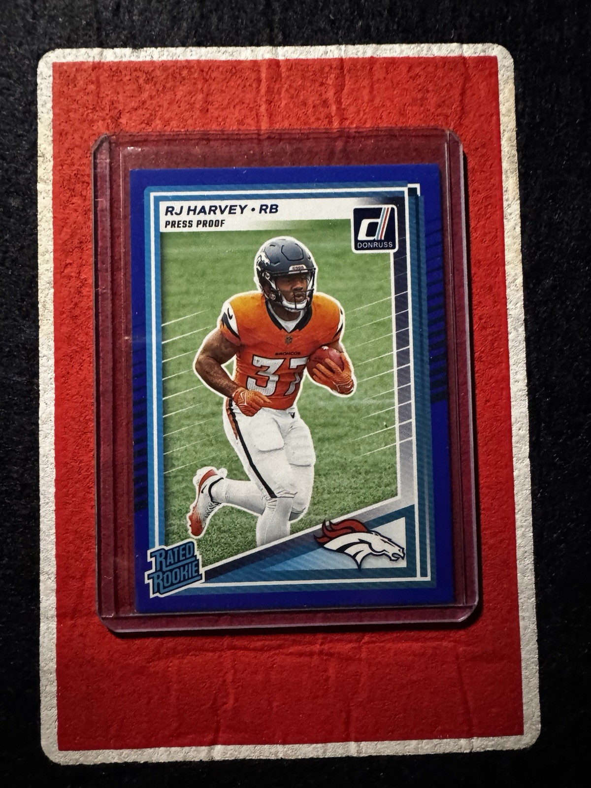 2025 Panini Donruss Rated Rookie RJ Harvey #312 Press Proof Blue