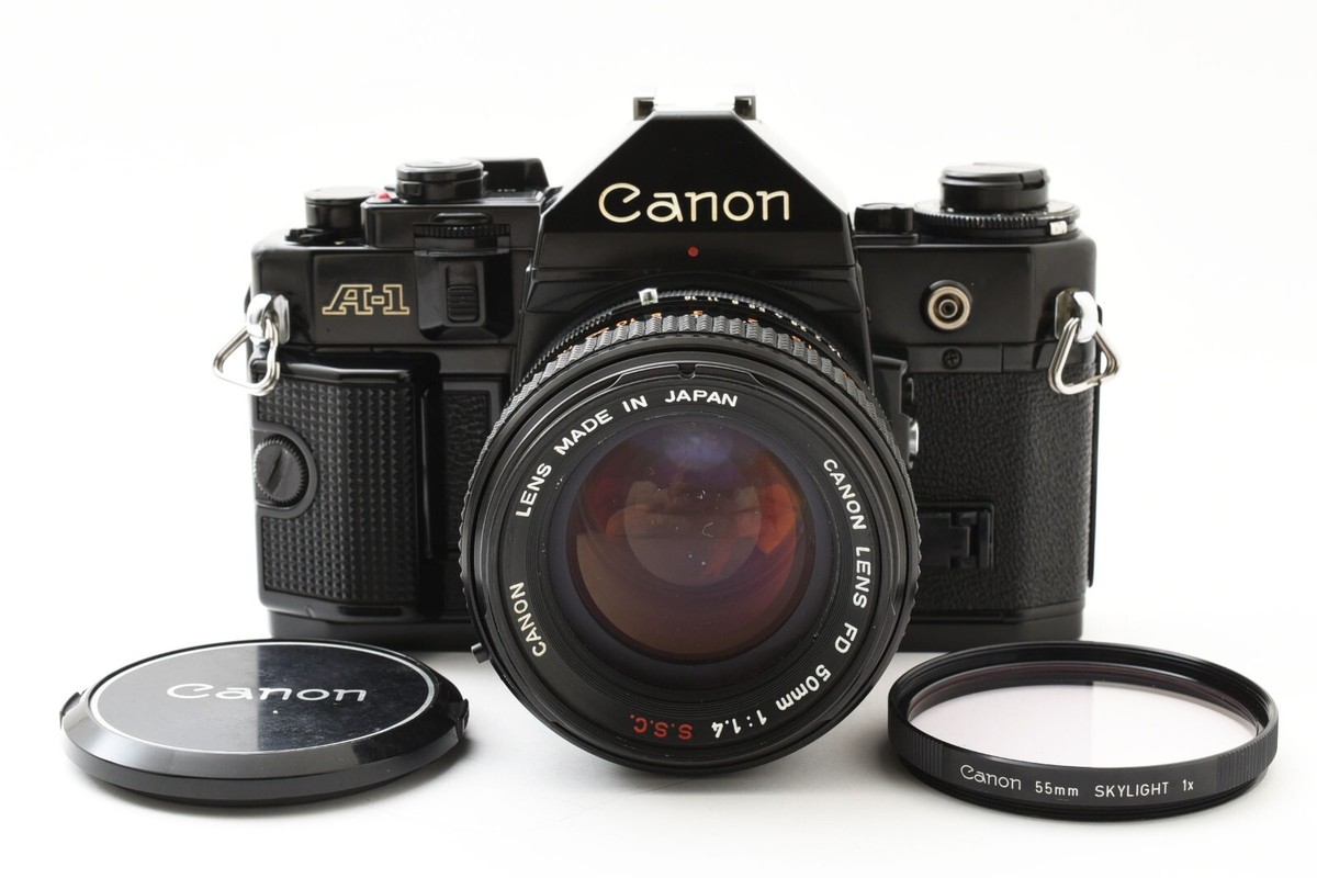 Exc+5** Canon A-1 Black 35mm SLR Film Camera + FD 50mm f/1.4 Exc+5** Canon A-1 Black 35mm SLR Film Camera + FD 50mm f/1.4