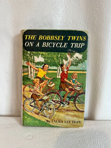 VTG. The Bobbsey Twins ON A BICYCLE TRIP 1958  Hardcover #48 - Picture 1 of 8