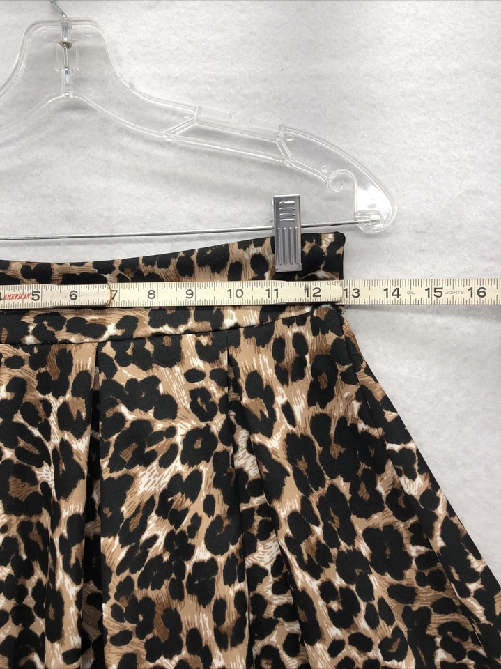 Falda para mujer Wet Seal pequeña plisada línea A acampanada leopardo mini estampado animal Foto 4 de 4