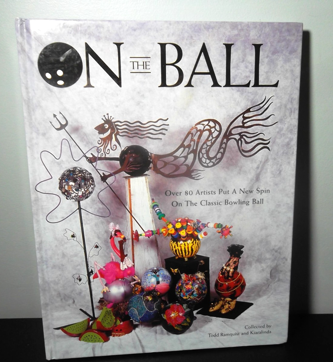 On the Ball : Over 80 Artists Put a New Spin on the Classic 