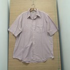 Pink and blue vertically striped vintage LL Bean men’s short sleeve Oxford shirt with button-down front and single chest pocket.