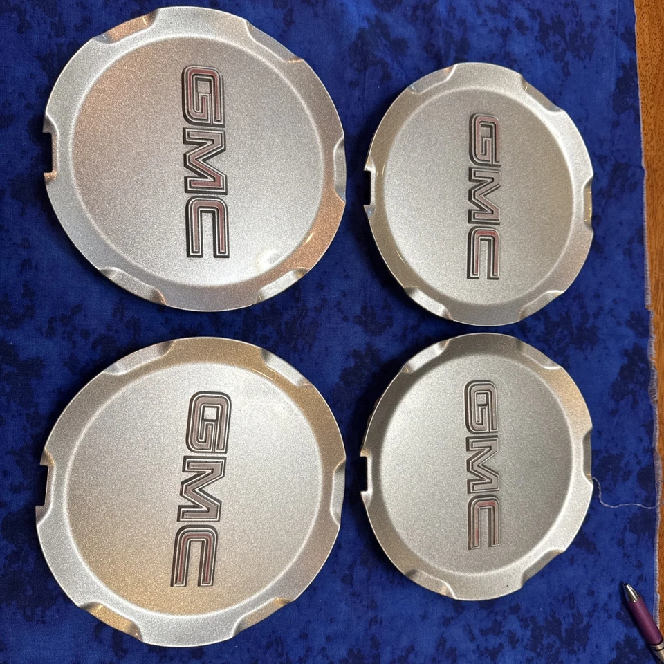 JUEGO DE 4 TAPAS CENTRALES DE TERRENO GMC ORIGINALES 2010-2015 P/N 9597973 plateadas OEM Foto 2 de 4