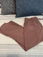 Lululemon Dance Studio Pants Cropped, Color is Red dust