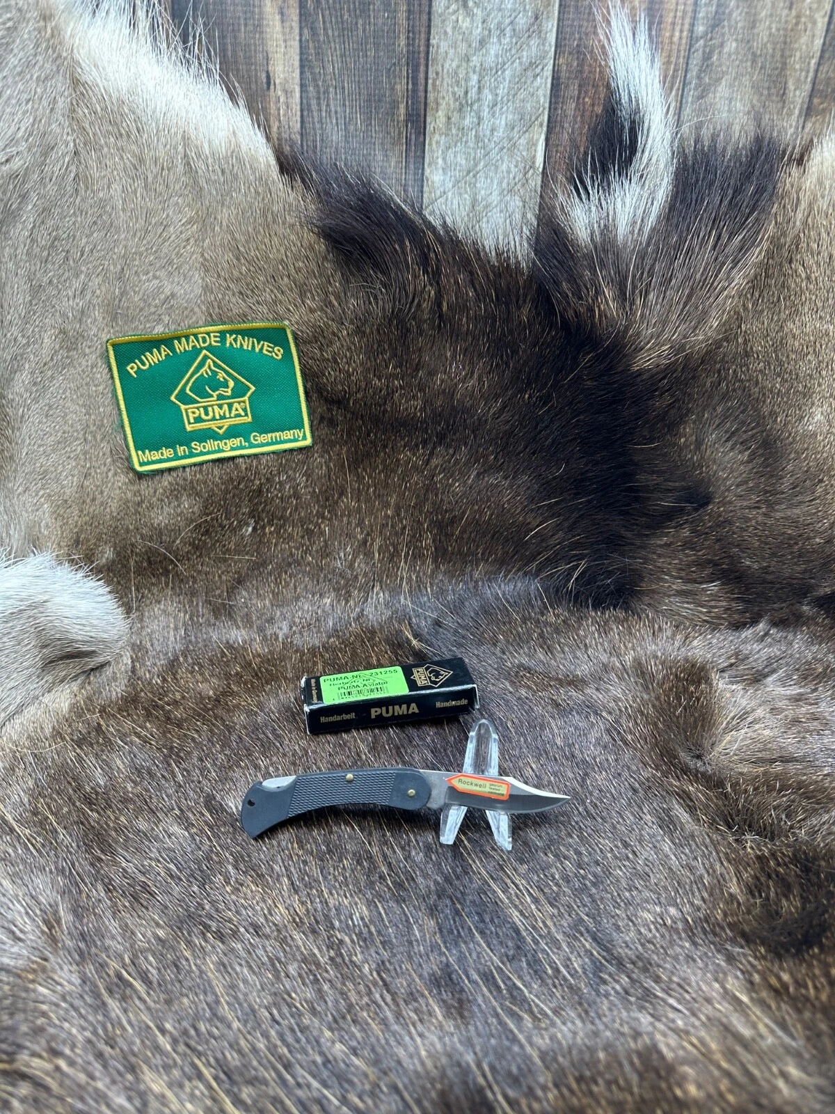 Coltello aviatore Puma 231 255 con manici a scacchi in ABS nero come nuovo con scatola