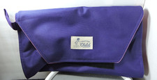 Practical child purple diaper changing pad folds up for easy traveling