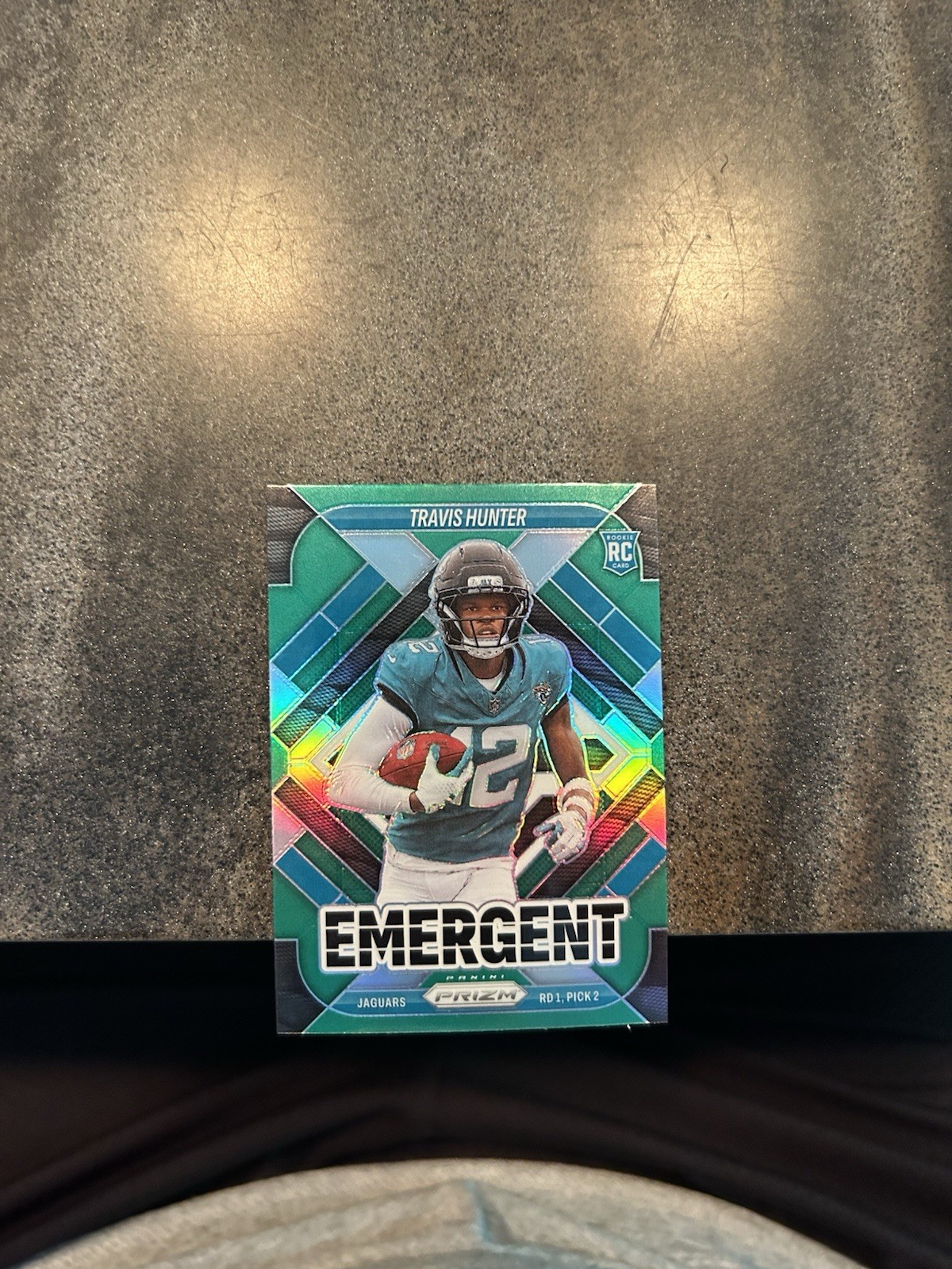 2025 Panini Prizm #12 Travis Hunter Emergent Green Wave (RC)