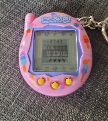 BANDAI Tamagotchi Connection Pink Ice Cream 2004 Tested BANDAI Tamagotchi Connection Pink Ice Cream 2004 Tested