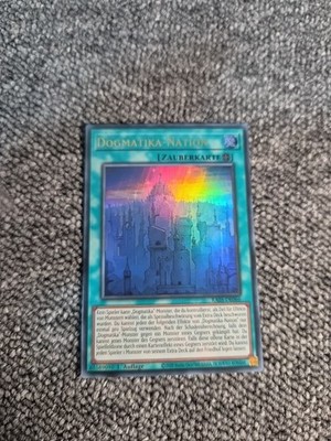 YU GI OH DOGMATIKA NATION  RA05-DE066  ULTRA RARE 1.AUFLAGE