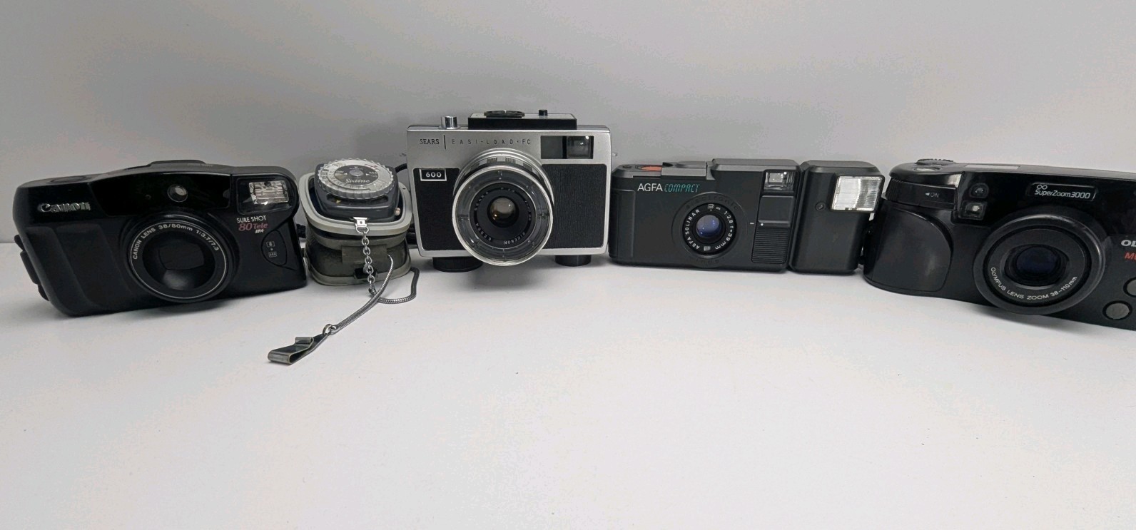 Lot of 4 Vintage 35mm AGFA Olympus Canon Sears 600 Gossen Sixtino Untested