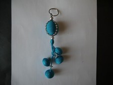 PORTE CLÉ PASSEMENTERIE MAROCAINE GROSSE BOULE AVEC 4 PETITES BOULES BLEU LAGON