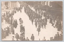 Postcard Military Men Marching in Formation while Crowd Watches Soldiers