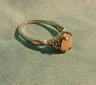 Faux Oval Shaped Fire Opal Ring with Clear CZs on the Sides SZ. 6.5 — photo 2