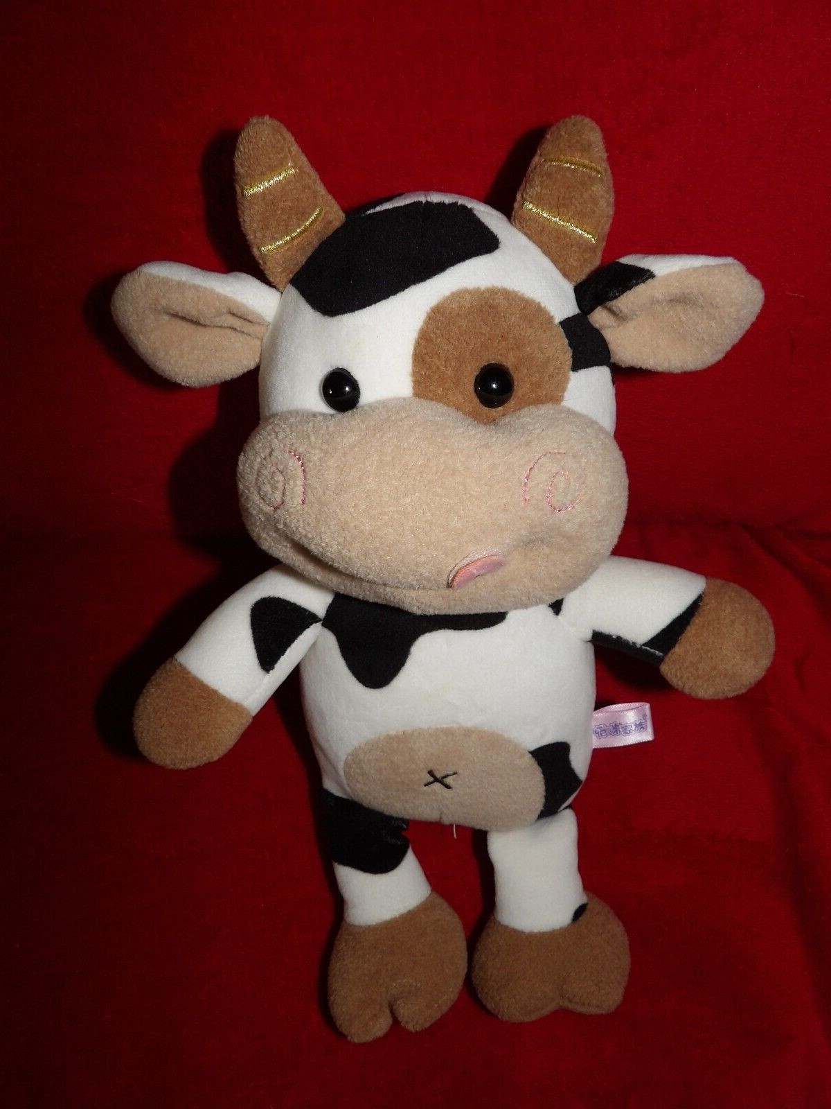 Peluche vache écru et beige Quindao confectionnée en microfibre premium