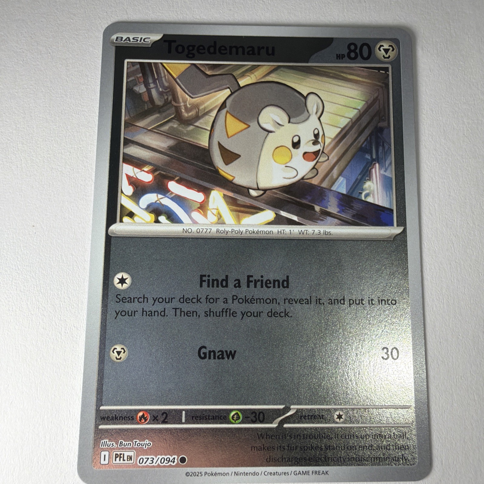 Togedemaru 073/094 Me02: Phantasmal Flames Reverse Holo