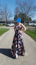 Navy blue prom dress with floral print worn once.