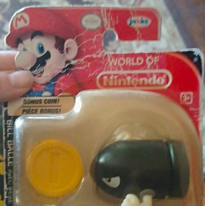Jakks Pacific World of Nintendo Bullet Bill Plastic Figure w/ Bonus Coin, Black