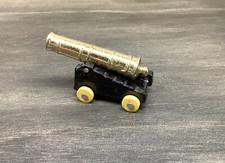 Vintage Brass Cast Iron Plastic Wheels Miniature Cannon 2 7/8" long Japan