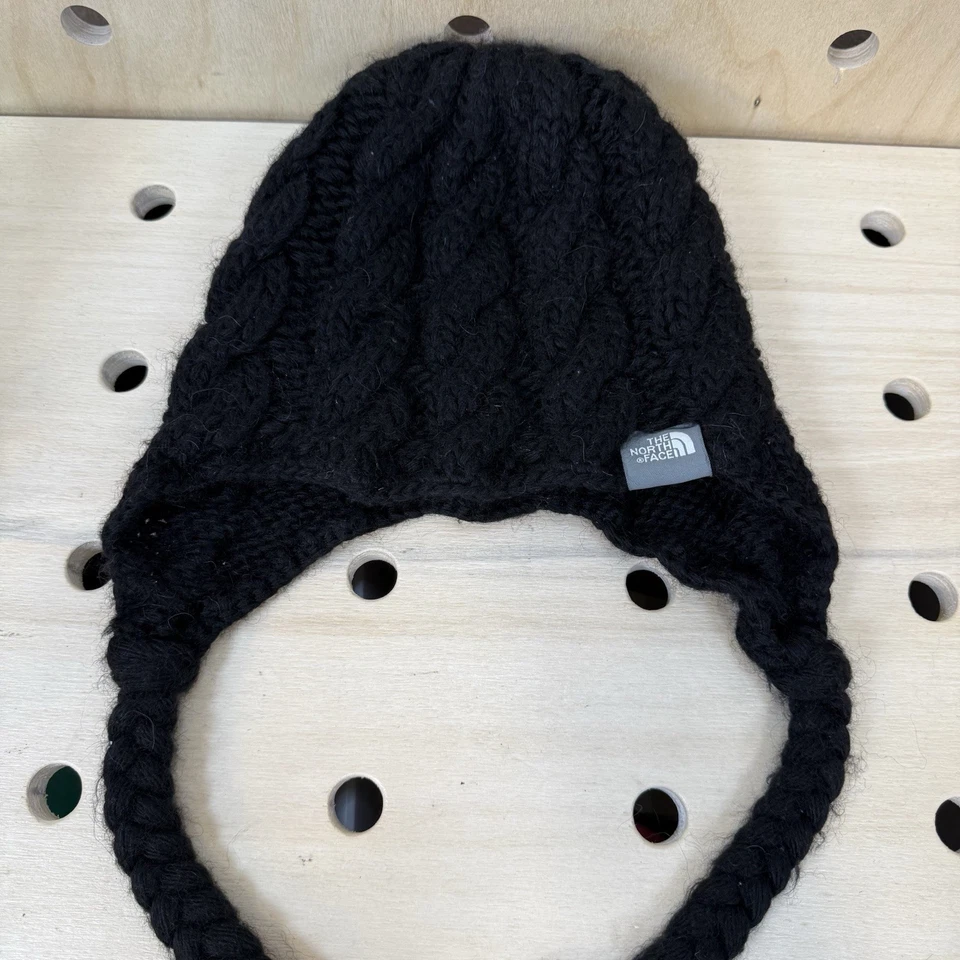 Sombrero trampero The North Face tejido con cable orejeras borla gorro negro mezcla de lana Foto 3 de 4