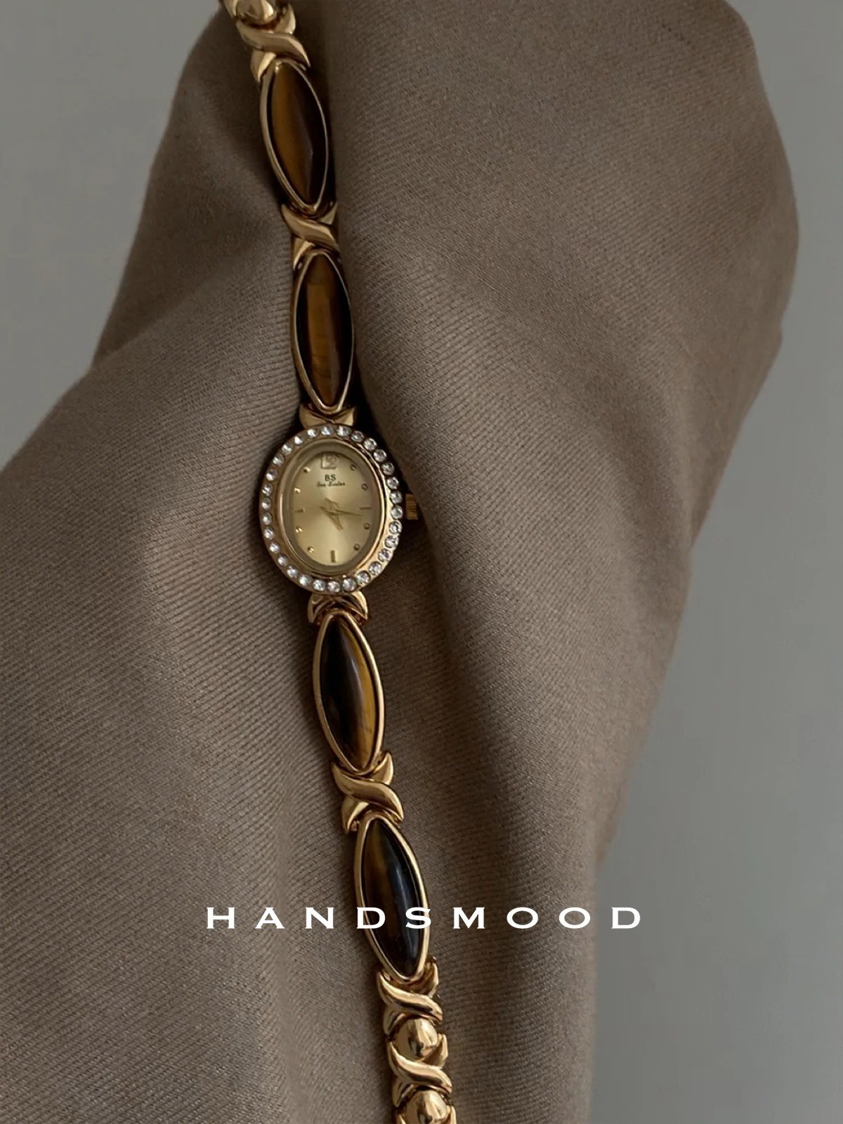 Montre vintage femme or et diamants 26mm, cadran oeil de tigre brun et bracelet rétro