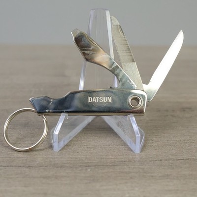 Vintage Datsun Multi-Tool Keychain Silver Tone Knife File Bottle Opener USA VGC