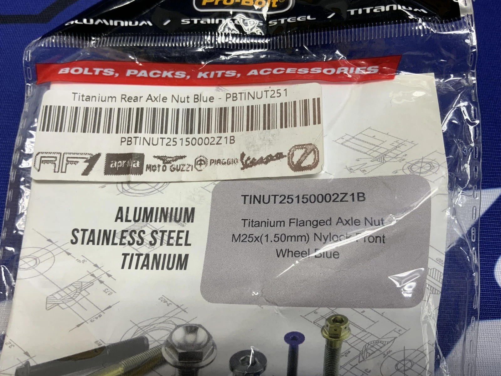 ProBolt Titanium Flanged Axle Nut M25X1.5 MM Nylock Blue PBTINUT25150002Z1B
