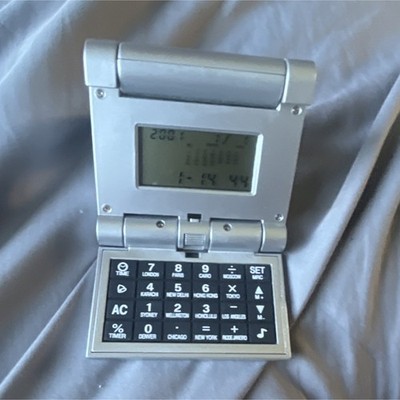 Pocket Multi-Function Calculator with World Time, Timer, and Clock Features