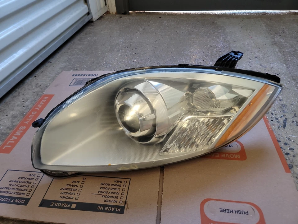 Conjunto de faros de xenón HID lado izquierdo/del conductor Mitsubishi Eclipse 2009-2012 OEM Foto 4 de 4