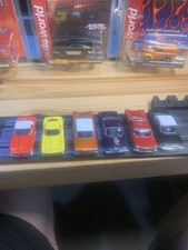 Auto World /Johnny Lightning, Bowtie Brigrade 6 NEW tjet style body lot.NICE