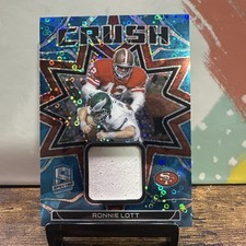 2023 Panini Spectra - Crush Ronnie Lott #CRU-RLO Neon Blue Prizm /60 (MEM)