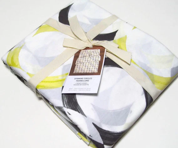 Funda nórdica West Elm varios colores gris negro amarillo círculos redondos giratorios King Foto 2 de 4