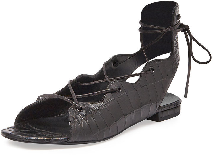 Sandali bassi stringati Saint Laurent Babies in rilievo all'crocio Prezzo consigliato: $ 695 Taglia: 36 5