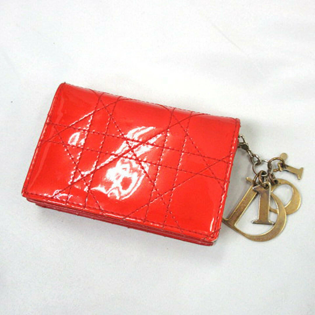 Christian Dior porte carte cannage rouge logo entreprise breloque
